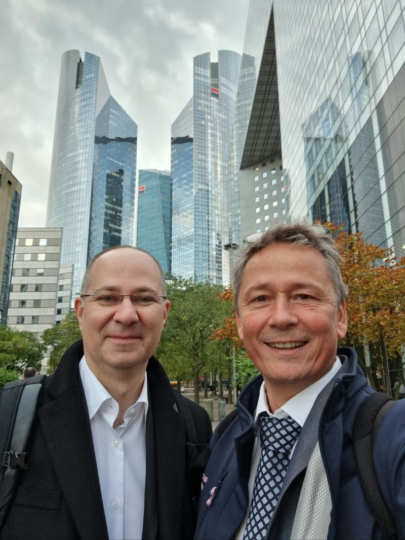 Nicolas Riegert with a colleague outside Société Générale headquarters in La Défense