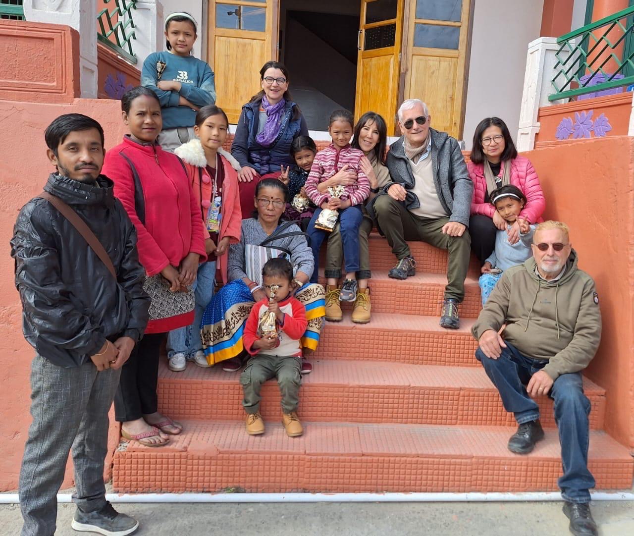 Nicolas Riegert, project supporters, staff and children at the orphanage